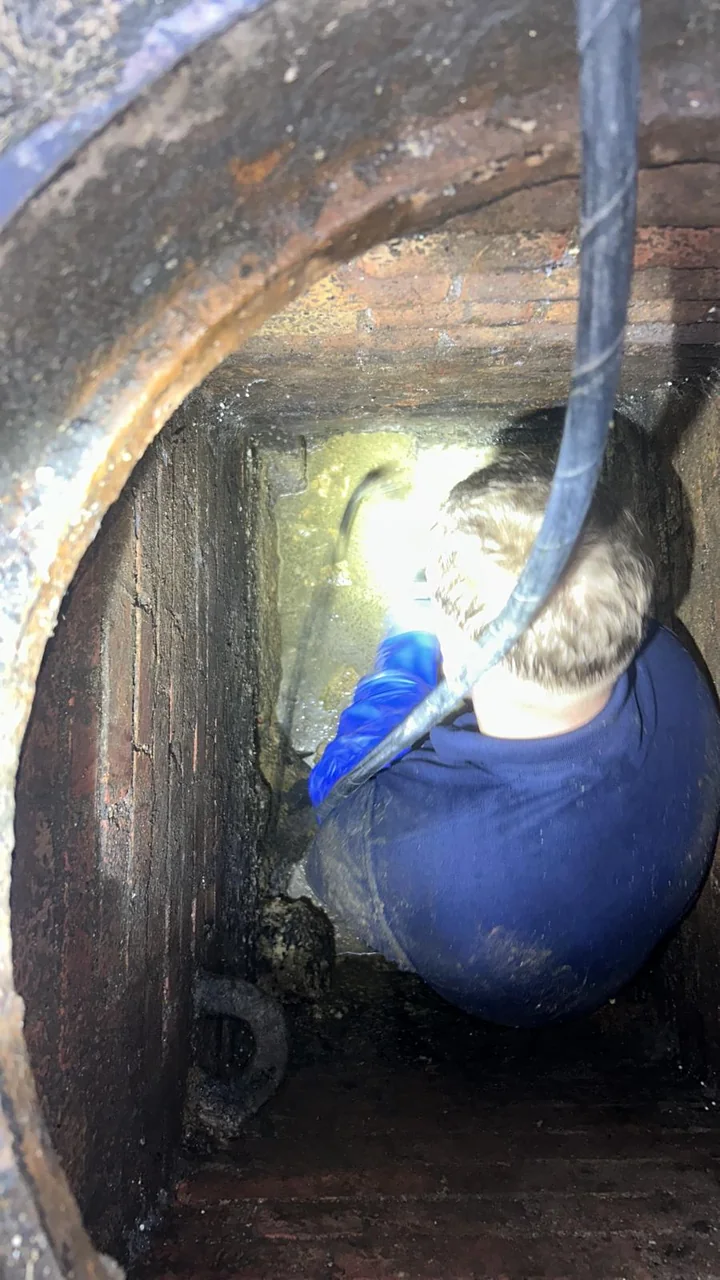 Emergency plumber in Essex isolating a burst water pipe