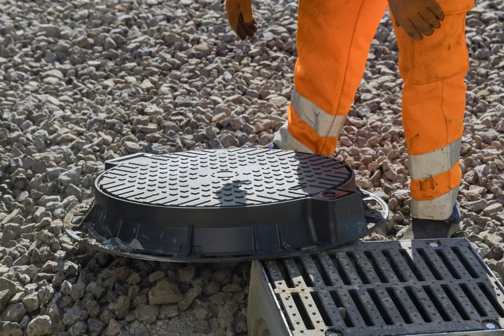 Blocked drain being cleared in Essex
